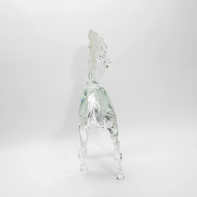 Crafted from the purest hand-blown Murano glass, this exceptional horse sculpture is a pinnacle of luxury artistry and...