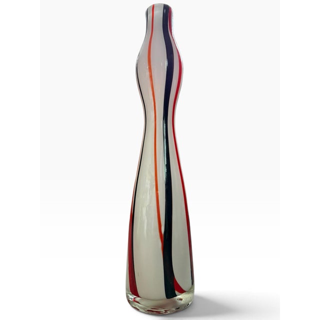 Striking vintage handcrafted glass vase by MayRich Company, featuring a tall, sculptural silhouette with dramatic flowing...