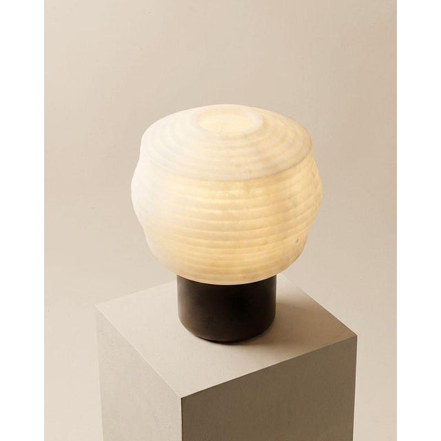 Papiro alabaster table lamp by luis gimeno dimensions: d 24 x w 24 x h 30 cm materials: alabaster finish: natural honed...