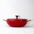 Beautiful cherry-red French midcentury braiser in excellent condition. Cast iron with red enamel exterior, white enamel...