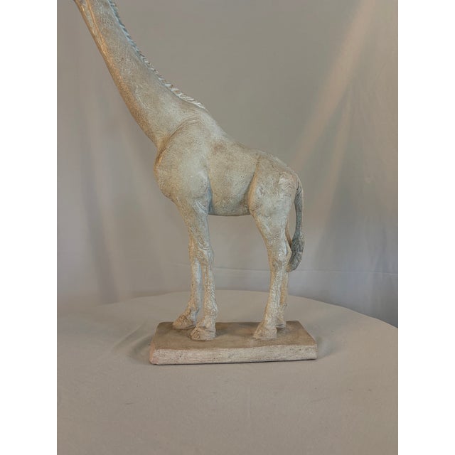 Graceful in both scale and form, this vintage standing giraffe sculpture by Austin Productions transforms a beloved...
