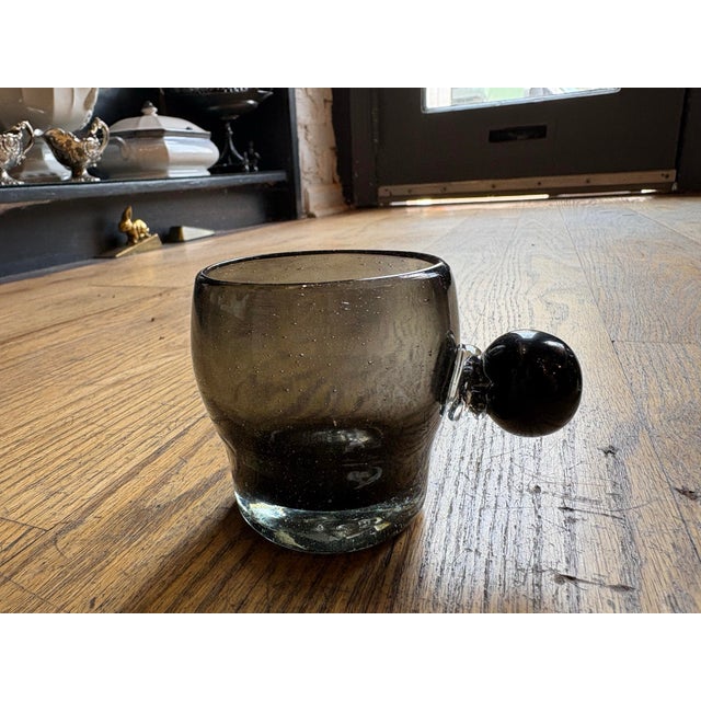 Bring a touch of artisanal charm to your morning ritual with this striking set of six mouthblown espresso cups, sourced...