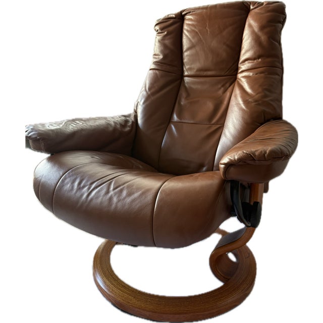 When my parents first bought this Ekornes stressless recliner chair with swing-out table, it was the reading chair in the...