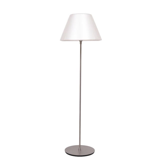 Very nice pair of Le Klint Floor lamps .Polished Aluminum uprights Comes with an acrylic glass shade with a Paper inlay ....