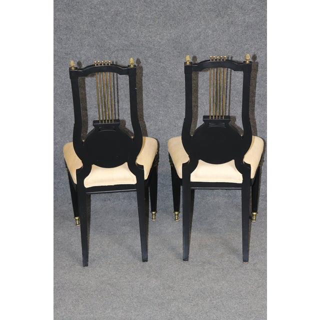20th C. Set 12 Jansen Ebonized Louis XVI Style Lyre Back Dining Chairs For Sale - Image 9 of 17