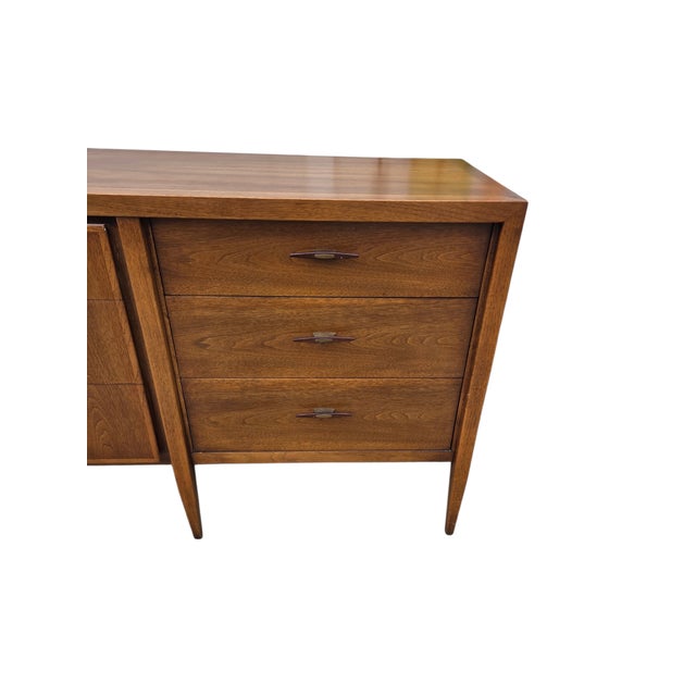 Great condition. minor wear. Walnut dresser with bronze and Rosewood handles. Great lines. Please see photos as they are...