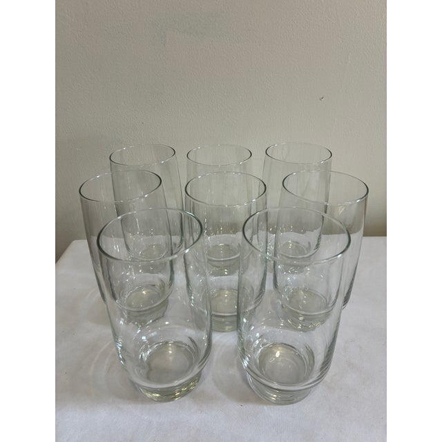 A set of eight vintage Arcoroc France Tivoli tumblers in clear glass. This classic French glassware design features a...