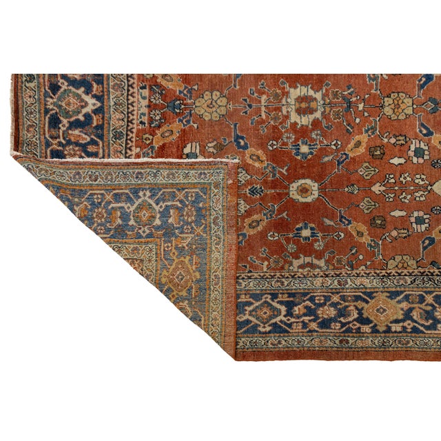 Bring a sense of history and warmth to your space with this authentic Vintage Persian Mahal rug. Hand-knotted from high-...