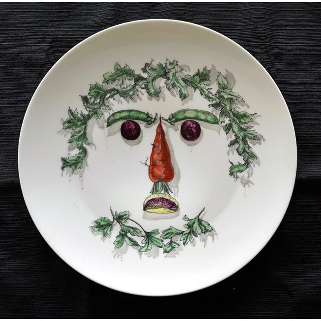 Fornasetti Porcelain Plate with face made with arranged vegetables. Stamped "6, Fornasetti-Milano, Made in Italy,...