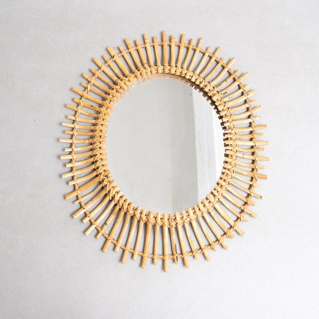 Mid-Century Modern French handcrafted bamboo wall mirror. By unknown artisan, circa 1960. In original condition, with...