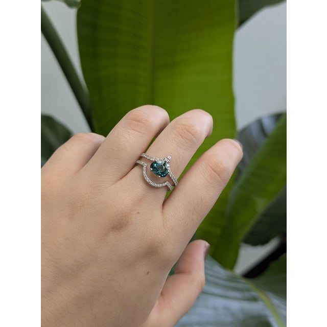 This elegant stackable ring features a sparkling 0.35 carat round diamond set in polished 14K white gold (1.57g). Designed...