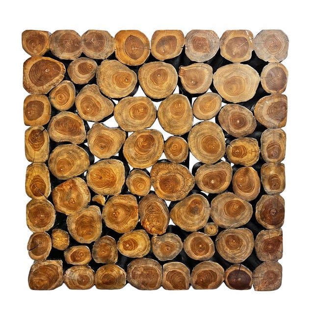 Bring warm rustic-modern character to your space with this impressive coffee table. Crafted from natural logs arranged...