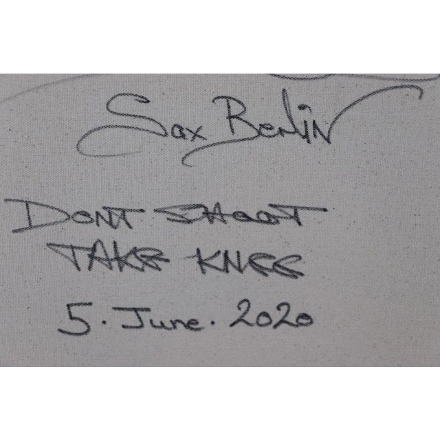 In classic Sharp Edge 21st Century New York Style, Berlin acknowledges and shows solidarity with the world mourning the...