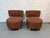 Stylish and versatile pair of round accent chairs, perfect for adding warmth and character to any living space. These...