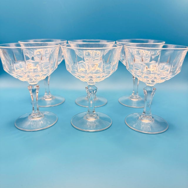 Beautiful and collectible set of 6 vintage crystal coupe glasses from Cristal D’Arques in the St. Germain pattern, made in...