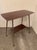 Serving table from the 1960s Chrome base with casters Shelf between the legs Good condition Dimensions: H 72 x W 75 x D 35...