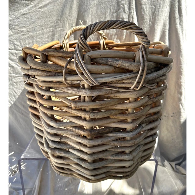 Super thick large woven rattan basket with handles. Great for storing logs or a big plant. Line it and you could store...