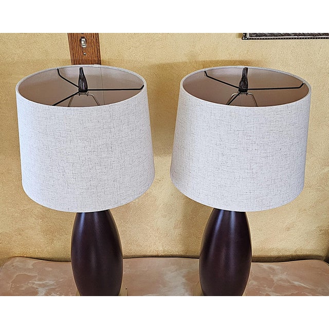 Pair of Contemporary Espresso Wood Hourglass Lamps With Brushed Nickel Accents and Linen Shades For Sale - Image 12 of 18