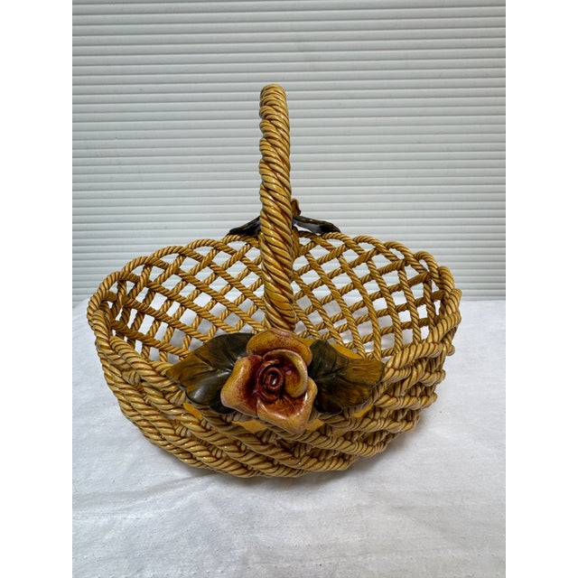 Design Plus Gallery presents a Hand Made Ceramic Basket from Primo'Gi. The decorative piece is known for its intricate...