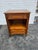 Kindel Grand Rapids Regency Style Fruitwood Nightstand. It features upper shallow drawer, an open shelf area, and an...