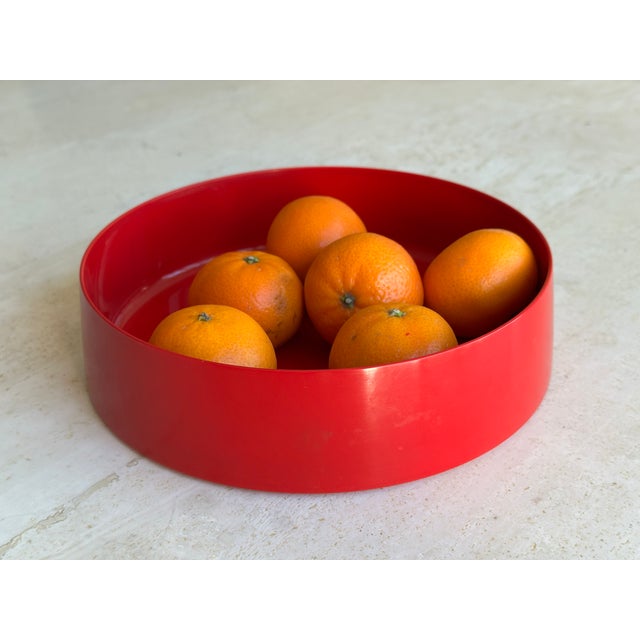 Very rare Kristian Vedel red melamine stacking bowl designed in 1958 for Torben Orskov. Currently, the dishes are held in...