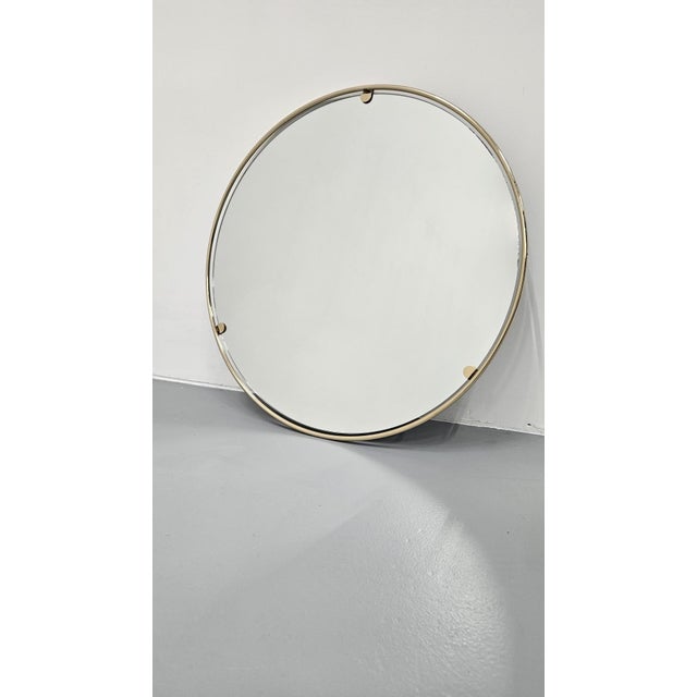 This exceptional solid brass wall mirror was designed and manufactured in Italy during the 1960s, a period defined by bold...