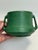 Early Weller Arts & Crafts pottery vessel (use it how you like) in the iconic matte green glaze. This softly glittering...