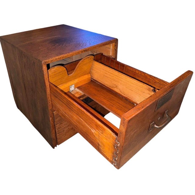 This vintage 2-drawer card catalog & filing cabinet was crafted sometime in the early 1960’s & was used by Chicago Paper...