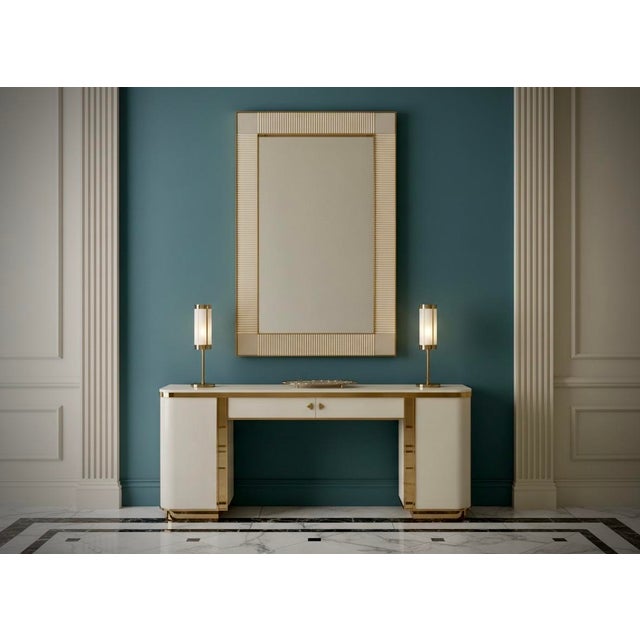 A strong cream colored frame reaches the eye of the beholder, leaving him enraptured; Wall mirror in cream coloured Murano...