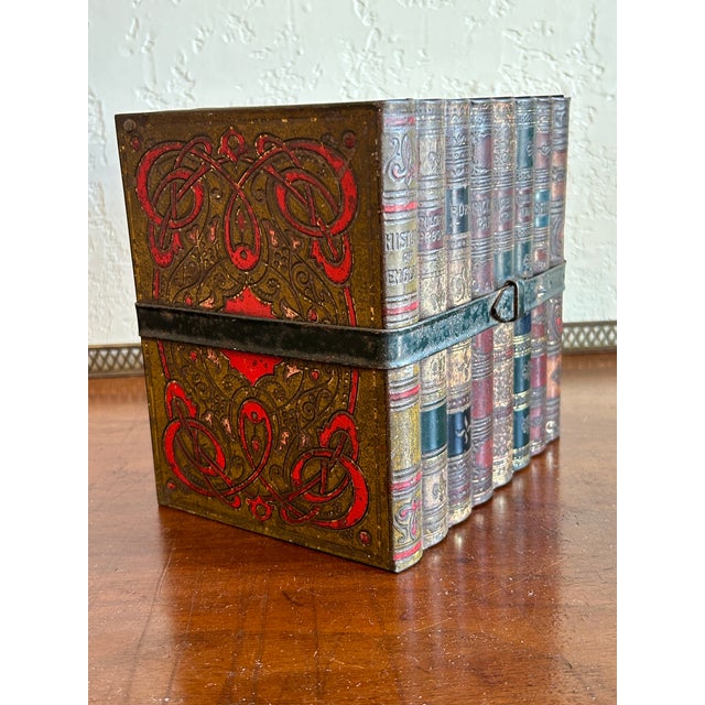 Charming Antique English biscuit, tin or box in a full book form with Art Nouveau decorated sides and faux marbleized...