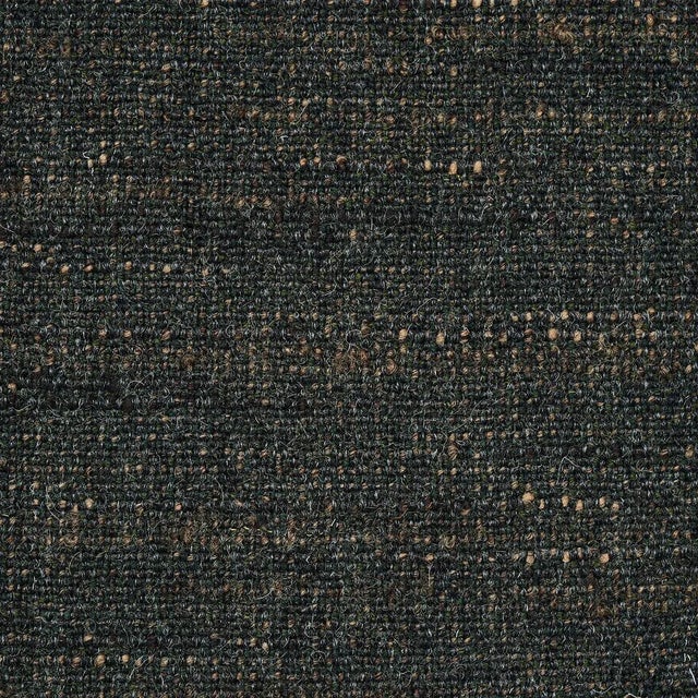 A unique textural weave of mÃ©lange and bouclÃ© yarns made of carded English wool creates a fabric that's the epitome of...