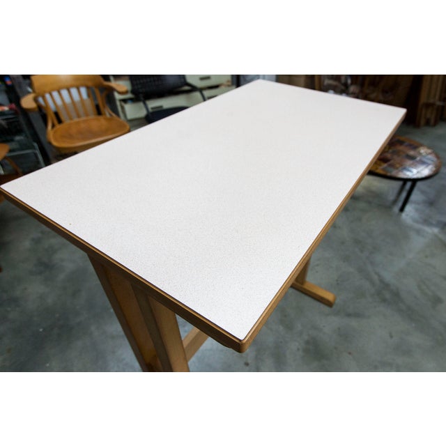 High table and 4 bar stools from the Baumann factory, circa 1990. A rare set, as they are from the last Baumann catalog,...