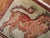What looks to be an early 20th century tiny rug mat from central Asia, most probably from the Khotan region from East...