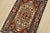 A traditional tribal Heriz rug hand-knotted with an all-wool pile on a cotton foundation. This oriental rug features a...