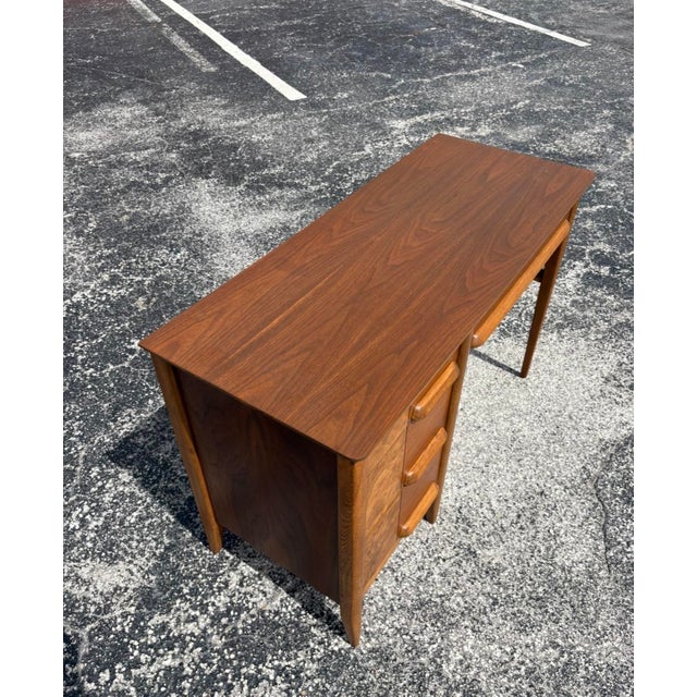 Mid century Stanley desk refinished in full - comprised of walnut, burl, and oak elements. All drawers function perfectly...