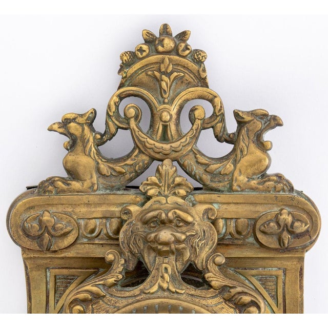 French Louis XV Style Bronze Cartel Clock, late 19th century, the porcelain dial hand-painted with Roman numeral indices,...