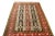 Originating from Persia between 1930-1950, this vintage Persian rug enjoys a unique Qum design with a series of intricate...