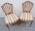 A pair of early 1900's Sheraton style Chairs, Solid Mahogany Hand carved frame, sheildback design, reeded legs