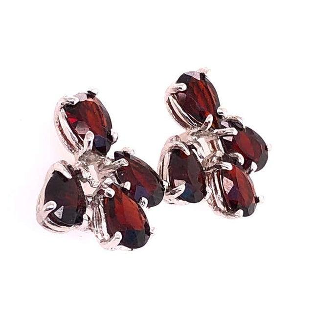14Kt White Gold and Garnet Earrings. 3.43 grams total weight.