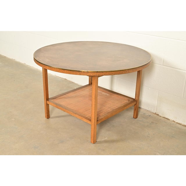 An exceptional Mid-Century Modern two-tier coffee table or cocktail table By Paul McCobb for Directional and produced by...