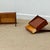 A beautifully sculptural pair of floating bedside tables designed by Omann Jun and handcrafted by Ølholm Møbelfabrik in...