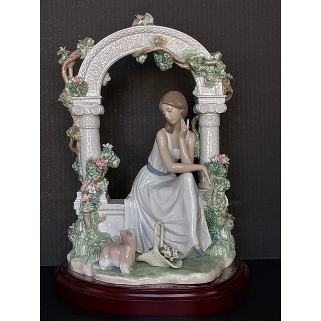 Lladró Tranquility (Model #06677) Porcelain Figurine, Featuring a Seated Woman Under a Floral Arbor For Sale - Image 4 of 6