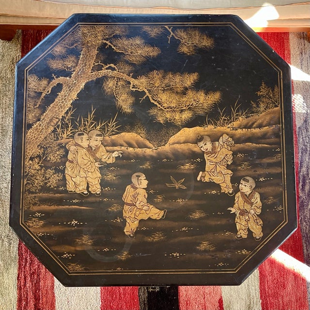 Octagonal Chinoiserie chest decorated with gold and green floral and bird motifs and beautiful poems inscribed on the...