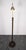 Art deco floor lamp 20s/30s. Minimal, geometric and simply shaped design. The lamp rod is adjustable in height. The lamp...