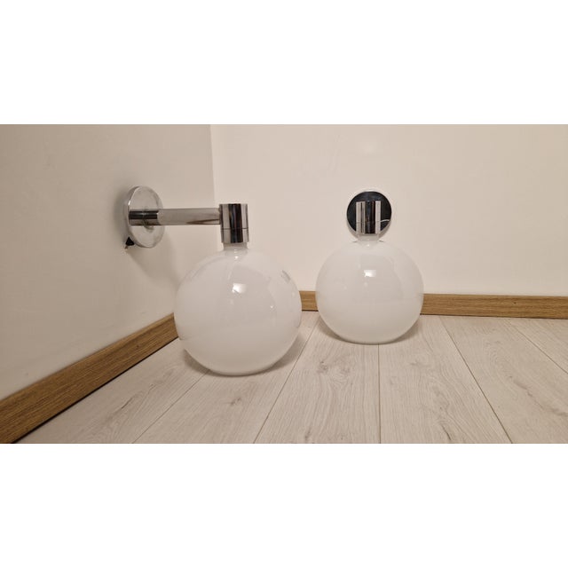 Wall Lamps with Spherical Opal Glass Diffusers by Franco Albini for Sirrah, 1970s, Set of 2, in Very Good conditions....