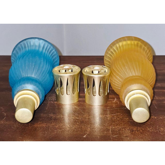A beautiful pair of vintage Lampe Berger Paris catalytic fragrance lamps featuring frosted ribbed glass bodies and...
