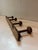 Charming and full of character, this set of vintage French coat hooks is designed in a classic faux bamboo style—an...