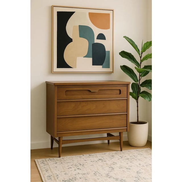 Mid Century Modern Petite Dresser by Bassett Furniture Co., c. 1960's. This thoughtful piece takes up minimal floor space...