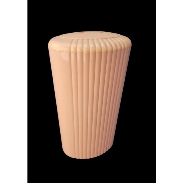 A fun vintage, probably 60's-70's hard plastic laundry hamper. This is such a wonderful throw back piece and in such a...