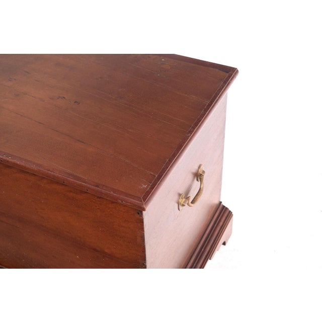 An incredible antique trunk. Handcrafted with quality wood and brass side handles. It fits into your home and goes well...